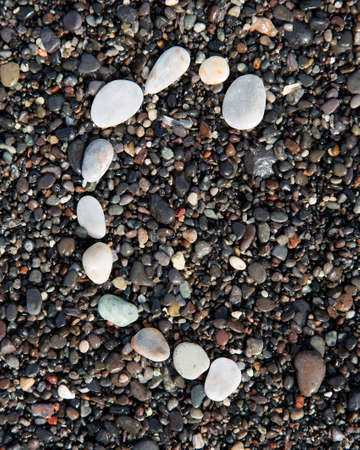 English letters of alphabet  laid on a black sandÐºÐµの写真素材