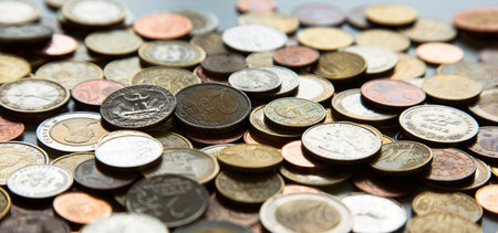 Lot of coins from different countries. Background and textureの写真素材