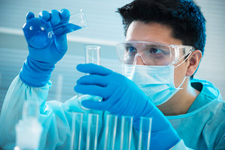 Young medical scientist working in laboratory