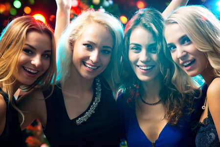 Happy girls at a Christmas partyの写真素材