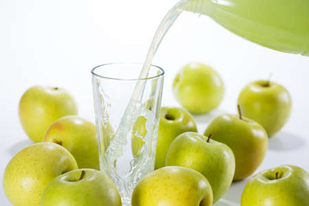 Green apple juice splashの写真素材