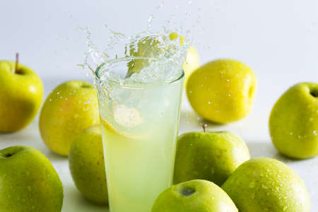Green apple juice splashの写真素材