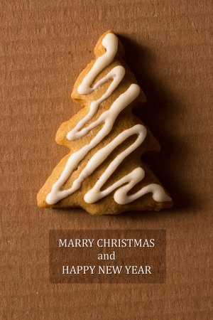 A postcard with a picture of a cookie Christmas tree for greeting your friends
