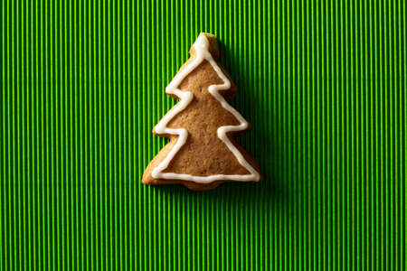 Postcard with the image of a Christmas tree cookie with space for your textの写真素材
