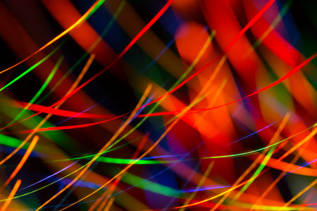 Abstract picture of bright colored dynamic lights on a dark background