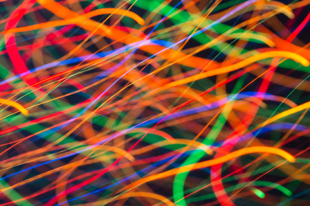 Abstract picture of bright colored dynamic lights on a dark background