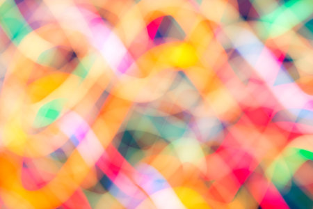 Abstract picture of bright colored dynamic lights on a dark backgroundの写真素材