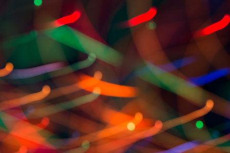 Abstract picture of bright colored dynamic lights on a dark background