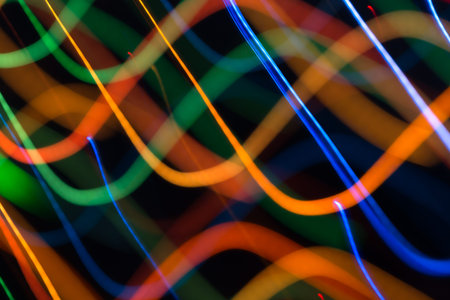 Abstract picture of bright colored dynamic lights on a dark background