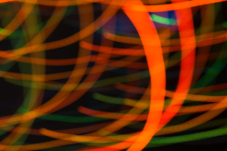 Abstract picture of bright colored dynamic lights on a dark background