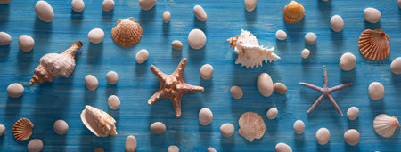 Beautiful background of sea shells and starfish on a blue background