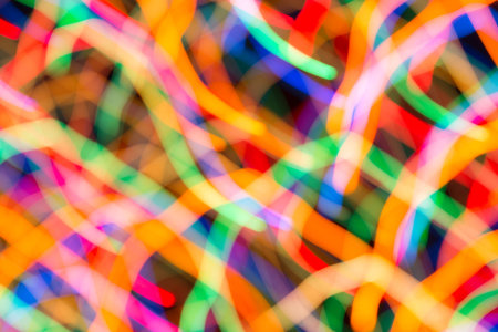 Abstract picture of bright colored dynamic lights on a dark background