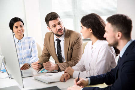 Business people working together in the modern officeの写真素材