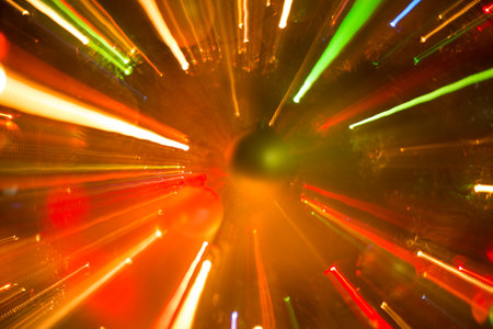 Abstract background of bright colored dynamic lightsの写真素材