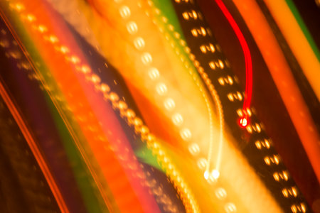 Beautiful abstract background of bright colored dynamic lightsの写真素材