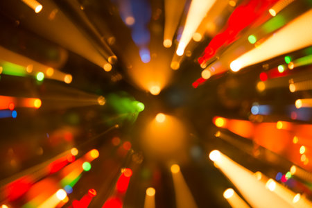 Abstract background of bright colored dynamic lightsの写真素材