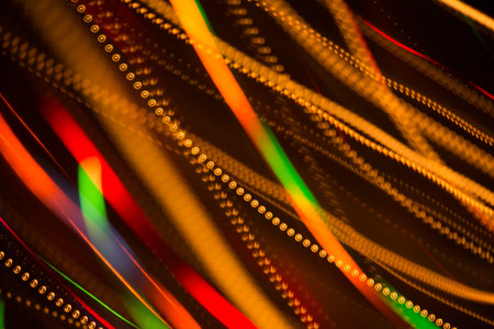 Beautiful abstract background of bright colored dynamic lightsの写真素材