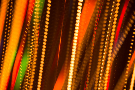 Beautiful abstract background of bright colored dynamic lightsの写真素材