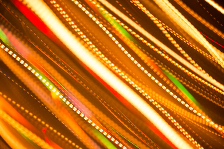 Beautiful abstract background of bright colored dynamic lightsの写真素材