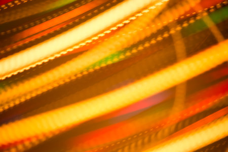 Beautiful abstract background of bright colored dynamic lightsの写真素材