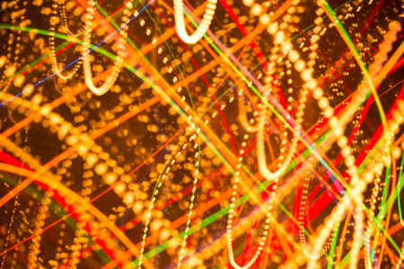 Beautiful abstract background of bright colored dynamic lightsの写真素材