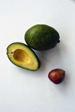 Composition of avocado. Whole, half and seedの写真素材