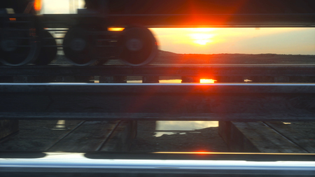 Freight train oil tankers. Against Sunrise. 3d rendering.の写真素材