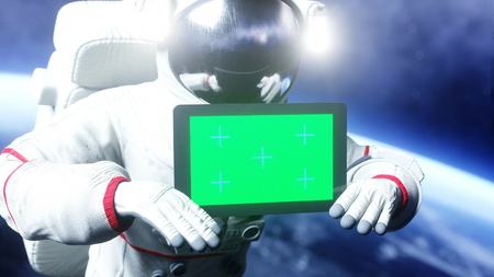 Astronaut in space with tablet, monitor. 3d rendering.の写真素材