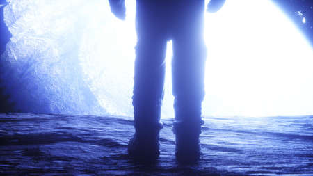 Alone astronaut in space rock cave. Space view. 3d rendering.の写真素材