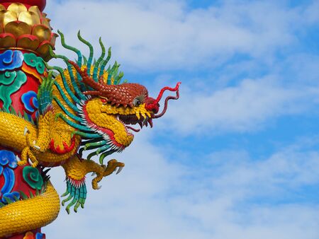 Colorful dragon statue background is sky.の写真素材