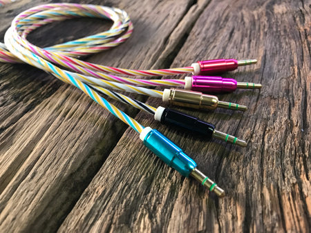 Colorful auxiliary lines on old wood floor with the concept of technology, cable, mobile...