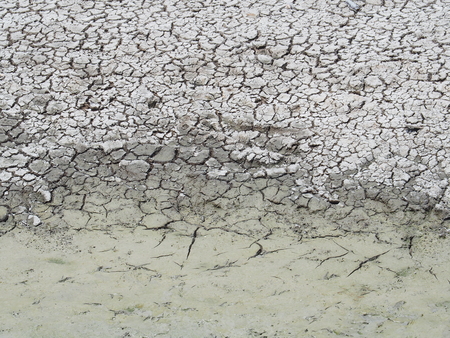 The soil is dry because of dehydration. With the concept of water shortage. Of global warmingの写真素材