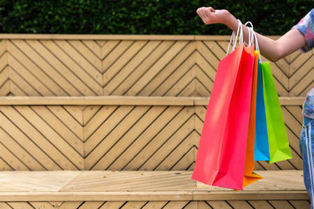 Closeup of girl holding shopping colorful of shopping bags,shopping conceptの写真素材