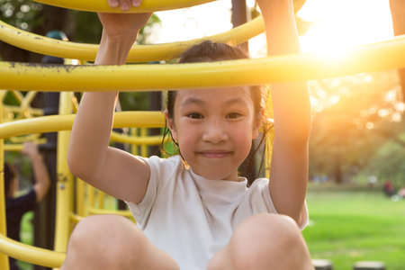 Asian girl playing in the playground,happy