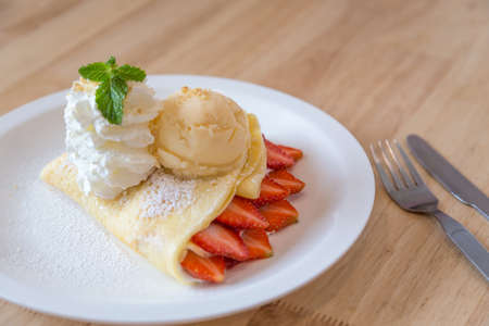 Strawberry Crape and vanilla ice creamの写真素材