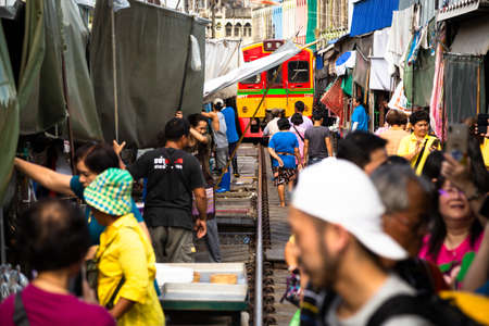 Samut Songkhram,Thailand-May 13,2019:Tourists at Talat Rom Hup,people visit Mae Klong Railway market or Mae Klong Train market,travel,unseen of Samut Songkhram,Thailandのeditorial素材