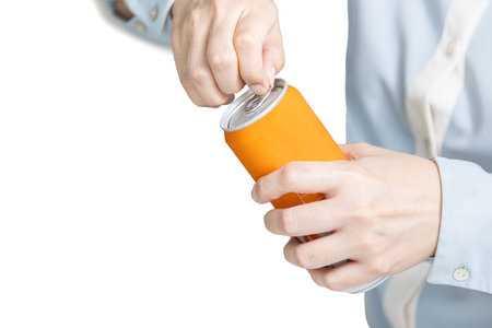 Hands of female using her fingers to open the pull tab of beverage can,unable to open a tin lid to...