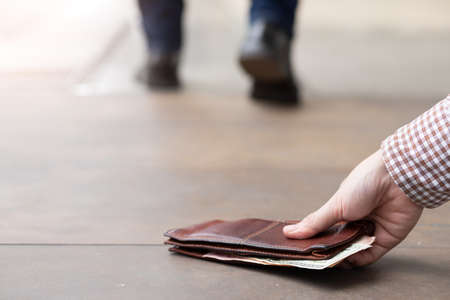 Picture of a man who keeps a purseの写真素材