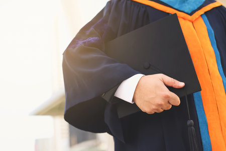 graduation,Student hold hats during commencement success graduates of the university,Concept education congratulation.Graduation Ceremony,Congratulated the graduates in University during commencement.の写真素材