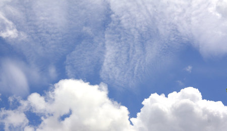 White clouds in the clear sky.