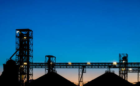 Bridge of factory silhouettedの写真素材