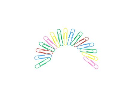 colorful paper clips with half circle shape on white background. Decorative paper clips in pink, yellow, green, red and blue colorsの写真素材