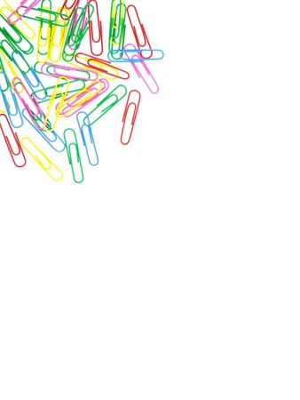 Colored paper clips on white background. Bunch of colorful paper clips on white background. Multicolored paper clips with space for textの写真素材
