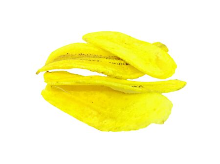 banana chips on white background. Tasty fried banana slicesの写真素材
