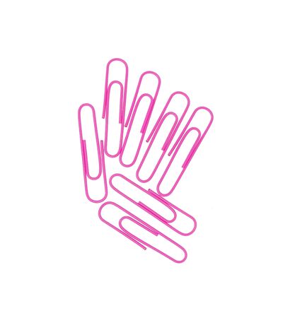 7 formation pink paper clips on white backgroundの写真素材