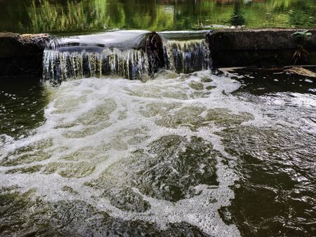 beautiful view of the river flow. Nature shallow river. Beauty of water dropletsの写真素材