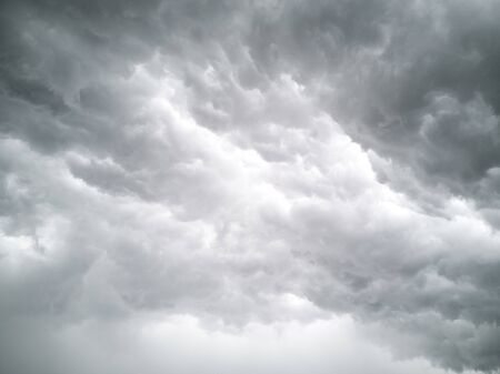 view of dark clouds in the sky before it rains. Clouds are becoming thunderstormsの写真素材
