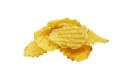 Crispy potato chips isolated on white background. Tasty fried potato slices in closeupの写真素材