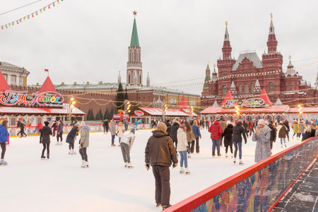 MOSCOW, RUSSIA - December 04 2019: People are ice skating on ice rink at Red Square.