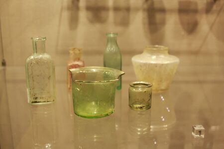 Russia, Moscow, 12.12.2017: The Moscow Archeology Museum. Archaeological finds, exhibits of the museum. Ancient glass vesselsのeditorial素材
